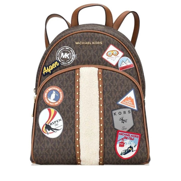 Michael Kors Other - Michael Kors Brown Backpack with Aspen patches sherpa detail like new (RARE)